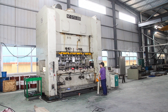 300 Ton Mechanical press with coil feder